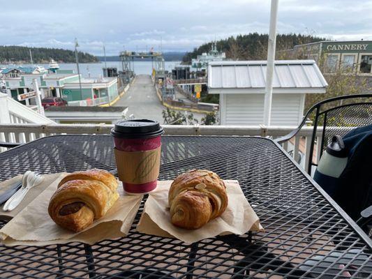 Chocolate croissant, almond croissant and chai latte with a great view of the harbor