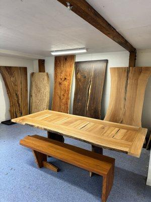 Here is a peak into our showroom with a variety of finished slabs, ready for you to make into the perfect table!