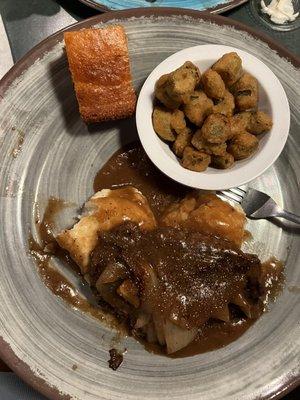 Chopped steak with onions hardy portion of mashed potatoes  And fried okra.