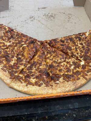 Burned cheese pizza