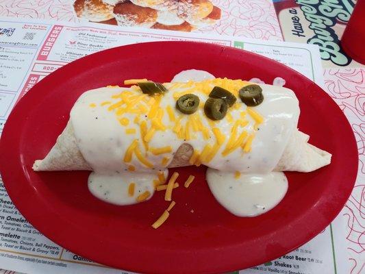 Breakfast burrito with country gravy.  The gravy works!