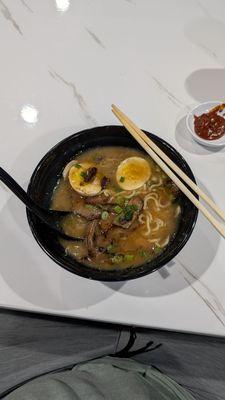 Beef Ramen with hot chili paste on the side.