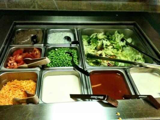 Very small salad bar. Weird and low sneeze guard.