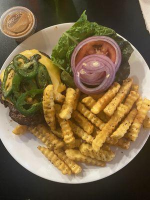 Delicious burger cooked to perfection with tasty seasoned crinkle fries. The secret sauce has a nice rich smoky flavor.  Excellent!