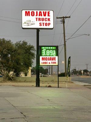 The street sign, with diesel prices in green. This is visible to people passing by on Business HWY 58.