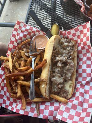 Philly cheesesteak with hand cut fries