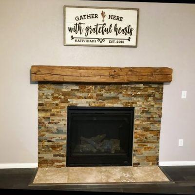 Hand hewn reclaimed barn beam mantle