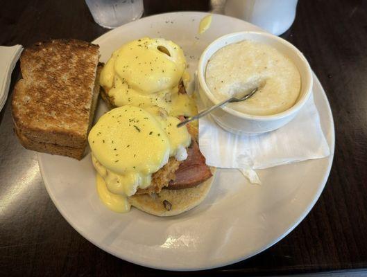 The Eggs NOLA special, poached eggs on English muffin with ham and cheese, with toast and grits.