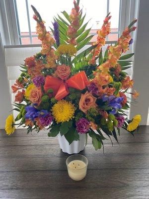 Flowers by David did a beautiful job on a funeral bouquet.  Called from out of state and asked for "florist choice."