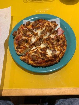 Personal all meat pizza.