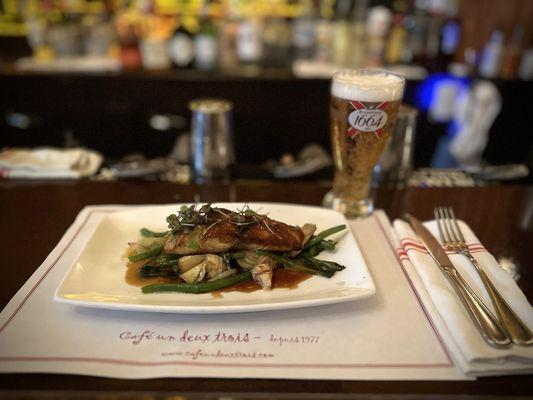 Pan sautéed sesame crusted Mahi Mahi with teriyaki sauce and French green beans, artichoke hearts and baby Bok Choi