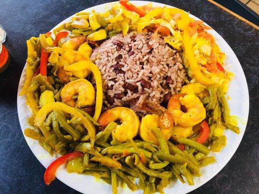 Curry Shrimp rice and peas and steamed cabbage