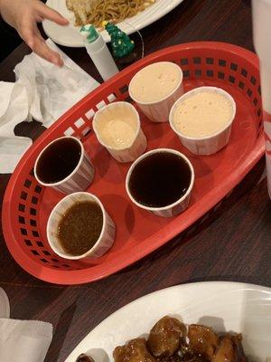 white sauce, gerlic sauce, & teriyaki sauce from the sauce bar