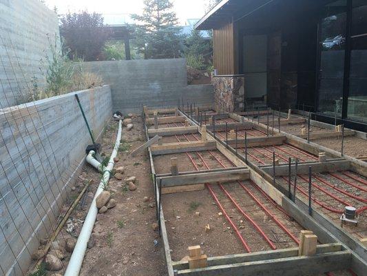 Architectural retaining wall and patio.