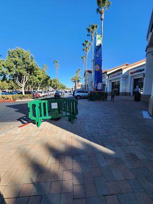 Cherry Orchard Shopping Center - car ran up onto sidewalk and hit the obelisk... destroyed a lamp post & damaged obelisk