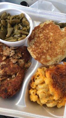 Salmon patty, green beans, macaroni and cheese, and a hoe cake.