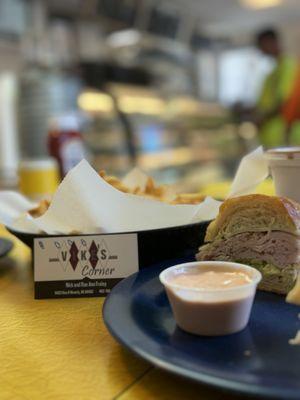 Turkey pesto on croissant, fries, chocolate malt.