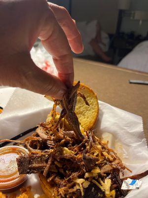 Stringy flavorless brisket.