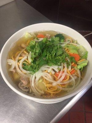 Big Bowl of Delicious Chicken soup with yellow noodle at request.