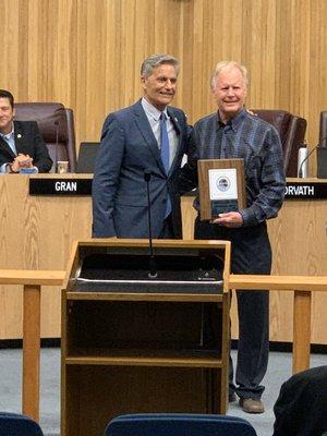 Owner Greg Halvorsen being honored by Redondo Beach Mayor Bill Brand with the "Civic Award".