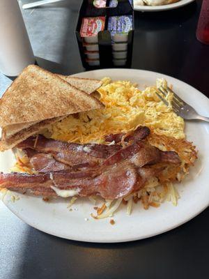 3 eggs, hash browns, bacon, and toast