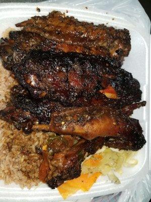 Large jerk turkey wings with rice and peas. $13.80