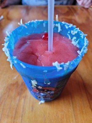 Super nom strawberry daiquiri with coconut flakes in a take-home cup!