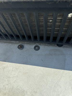 Bolts from A/C cover not out back on