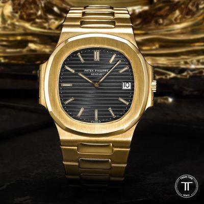 Patek Philippe Nautilus Jumbo 18K Yellow Gold Black Ribbed Dial Ref. 3700/1J Circa 1982