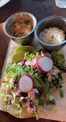 Fish tacos with consomé and white rice.