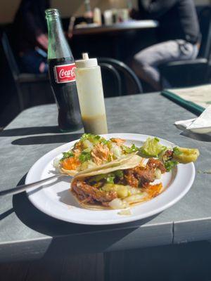 Al Pastor taco. Chicken taco, Mexican coke. Salsa Verde.