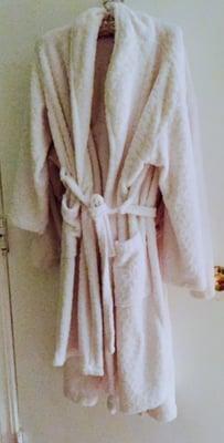 A very soft robe awaits you.