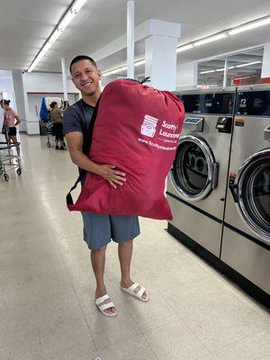 Another HAPPY customer with their huge Scotty's laundry bag!