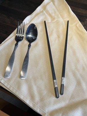 The chopsticks are heavy-duty and not disposable. The ends are slightly textured which helps hold the food better.