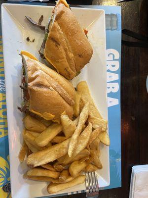 Philly cheesesteak and steak fries.