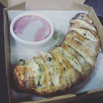 Yummy calzone, any toppings you like!! We also have specialty Stromboli's and calzones