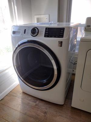 GE Washing Machine -floor model bought for a song and dance.