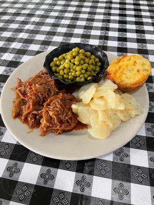 Slow Roasted Pork with BBQ Sauce, Scalloped Potatoes, Peas and Jalapeno Cornbread