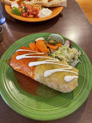 Super Smothered Burrito (beef filling with half ranchero sauce half tomatillo sauce)