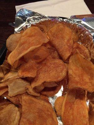 House made chips- cold and a bit bland. Could really use dip or spice.