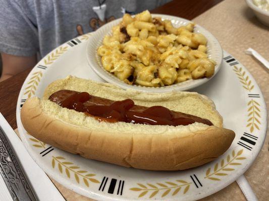 Hot dog with mac and cheese.