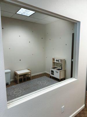 Treatment room with view through observation window