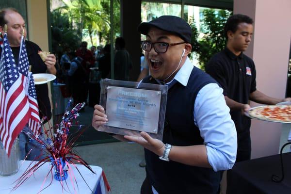 Duane mugging with his well-earned award.