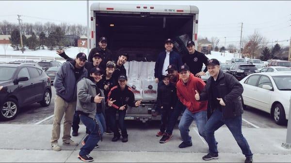 The owner, managers, and workers after completing 1,500 boxes lunches!