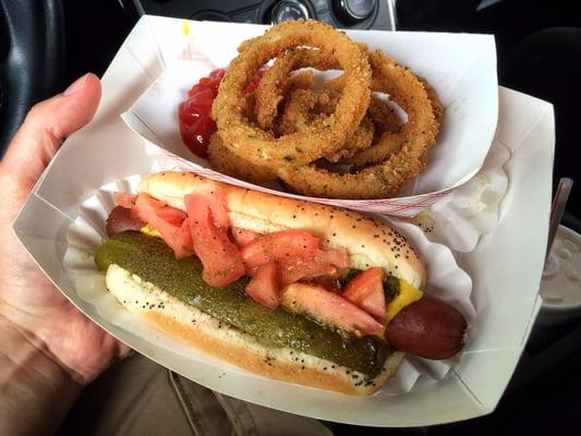 Jumbo Chicago dog and a side of onion rings.