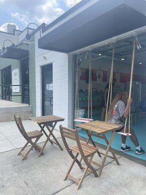 Cute outside seating. Love the swings!