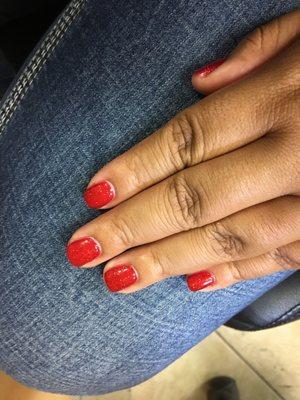 Red gel manicure for the holidays. Amazing job. Bonus my  cuticles were not cut or ripped. I was left feeling great.