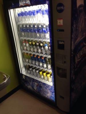 Vending machine with protein shakes, water and energy drinks.