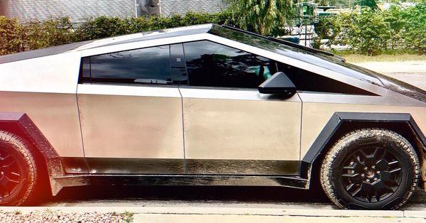 Tesla truck out front grabbing a to go order.