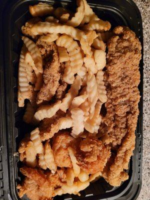 Fried catfish strips, fried shrimp and French fries.